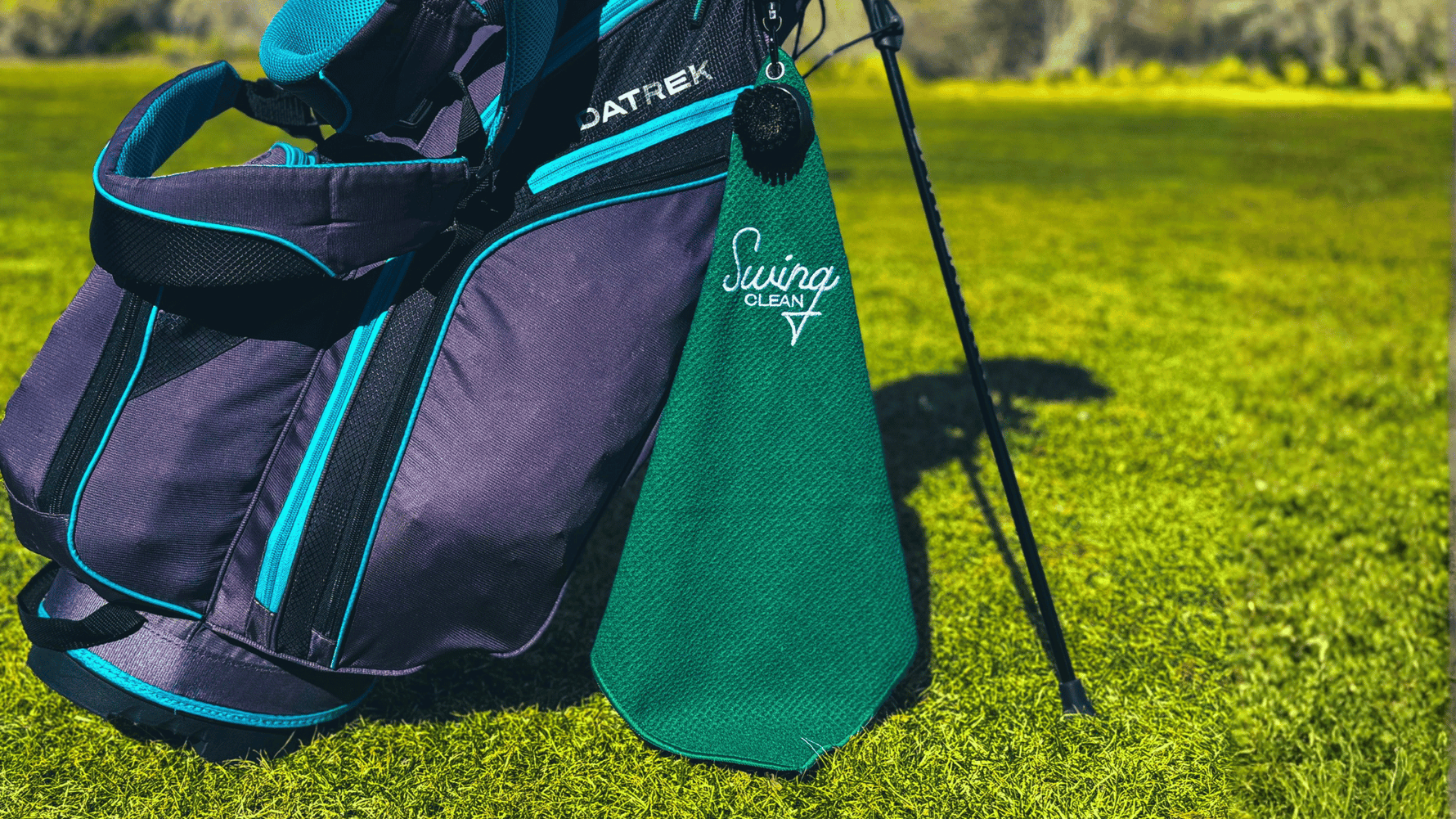 Golf bag with green cleaning towel