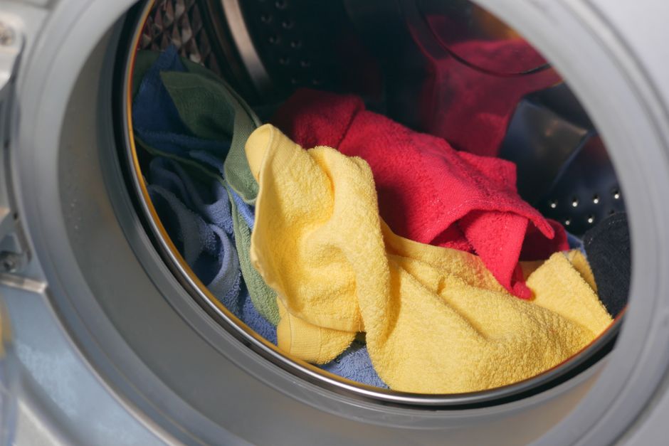 Mixed color clothes inside washing machine
